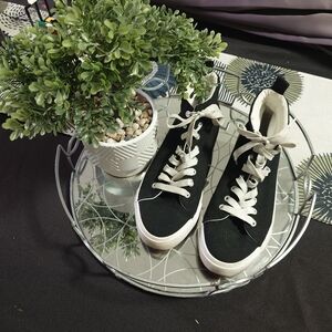 Step up your wardrobe! Black High-Top Sneakers with White Laces